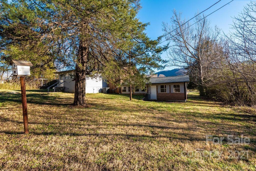 5196 Jenkins Road Morganton, NC 28655 - Photo 7 of 46 a view of a house with a yard covered in snow