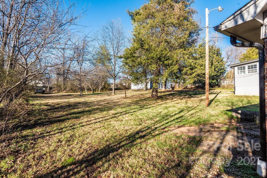 5196 Jenkins Road Morganton, NC 28655 - Photo 8 of 46 a view of road with large trees