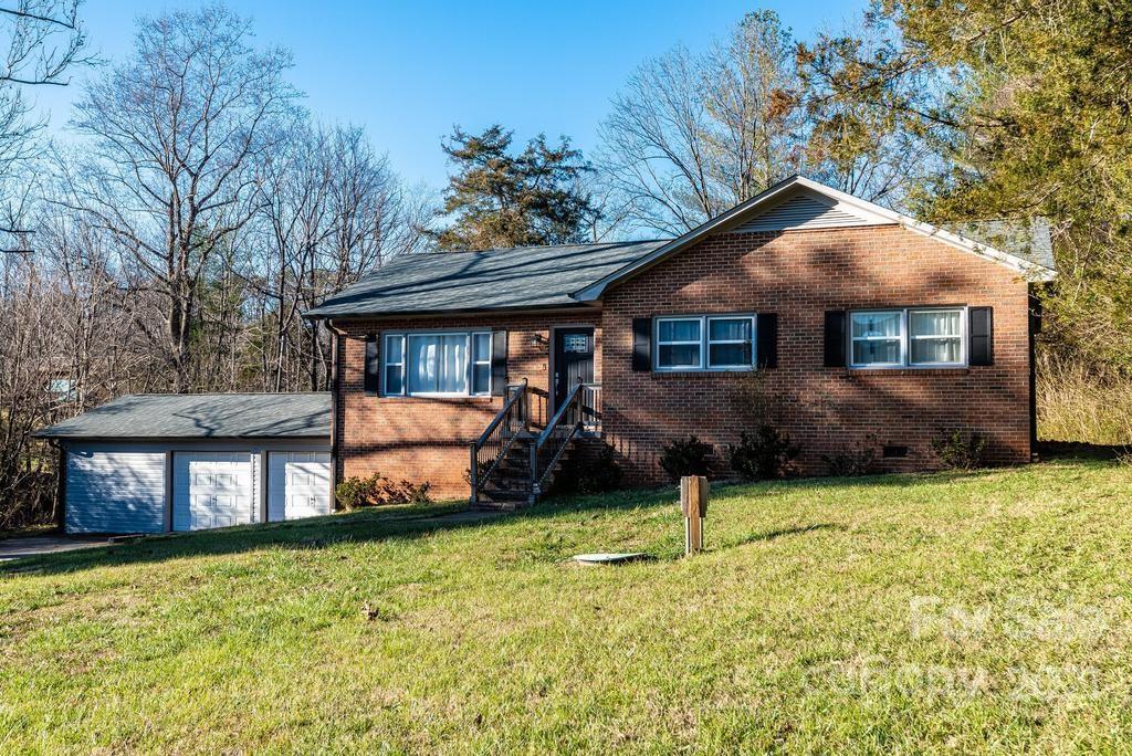 5196 Jenkins Road Morganton, NC 28655 - Photo 10 of 46 a front view of a house with a yard