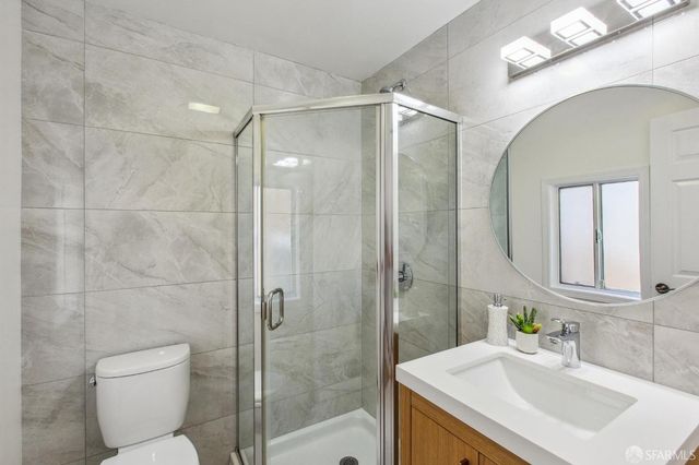 a view of balcony with wooden floor