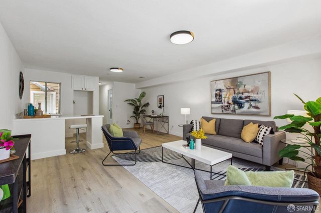 a view with bathroom sink and mirror