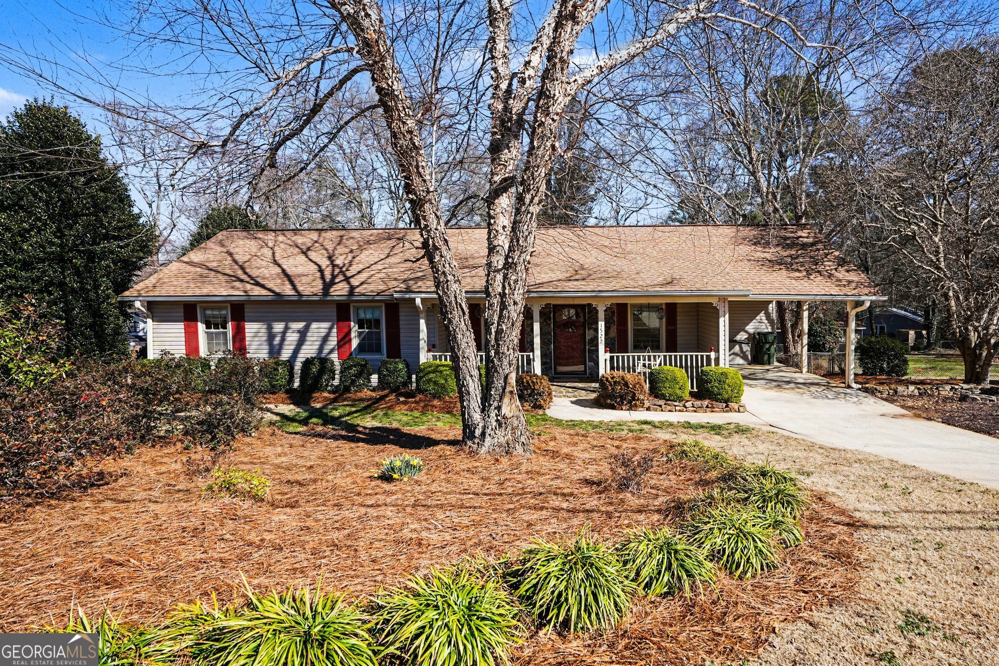 1522 Zebulon Road Griffin, GA 30224 - Photo 2 of 28 a front view of a house with a yard patio and swimming pool