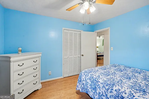 a view of balcony with wooden floor and outdoor seating