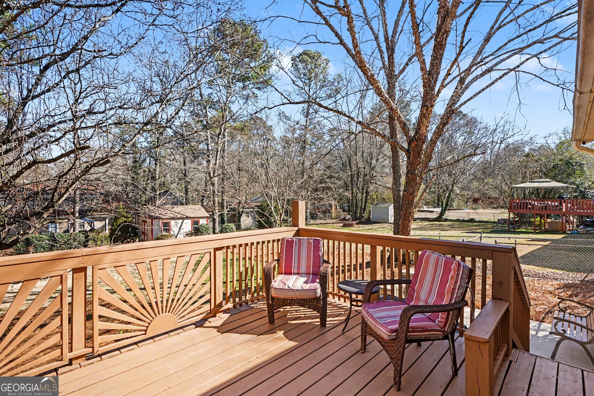 1522 Zebulon Road Griffin, GA 30224 - Photo 24 of 28 a view of balcony with wooden floor and outdoor seating