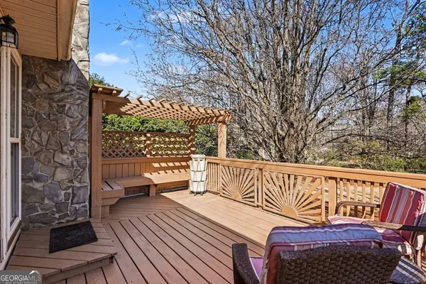 a view of a house with snow on the road