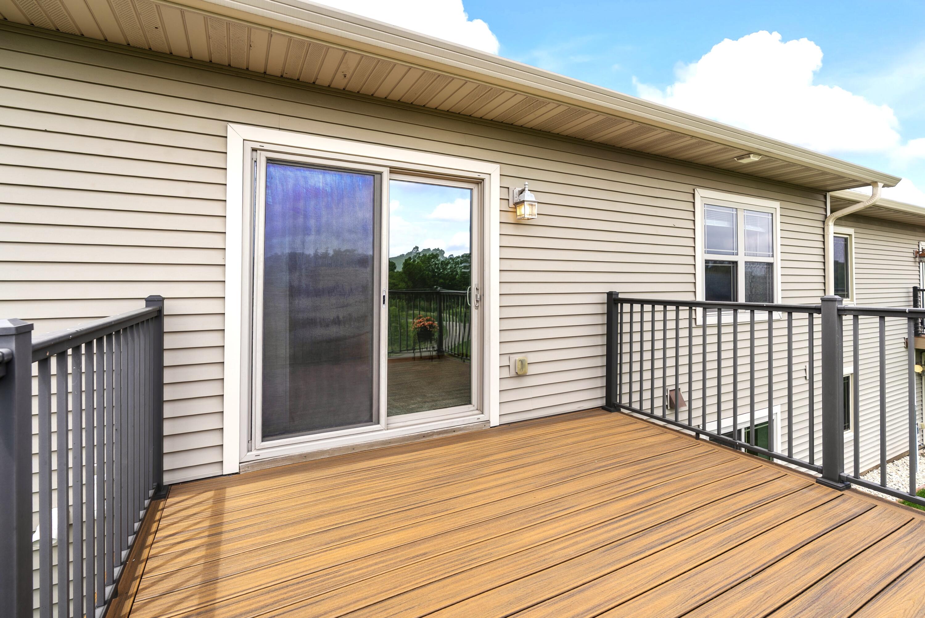 113 Community Drive Fall River, WI 53932 - Photo 37 of 40 Deck off Flex Room