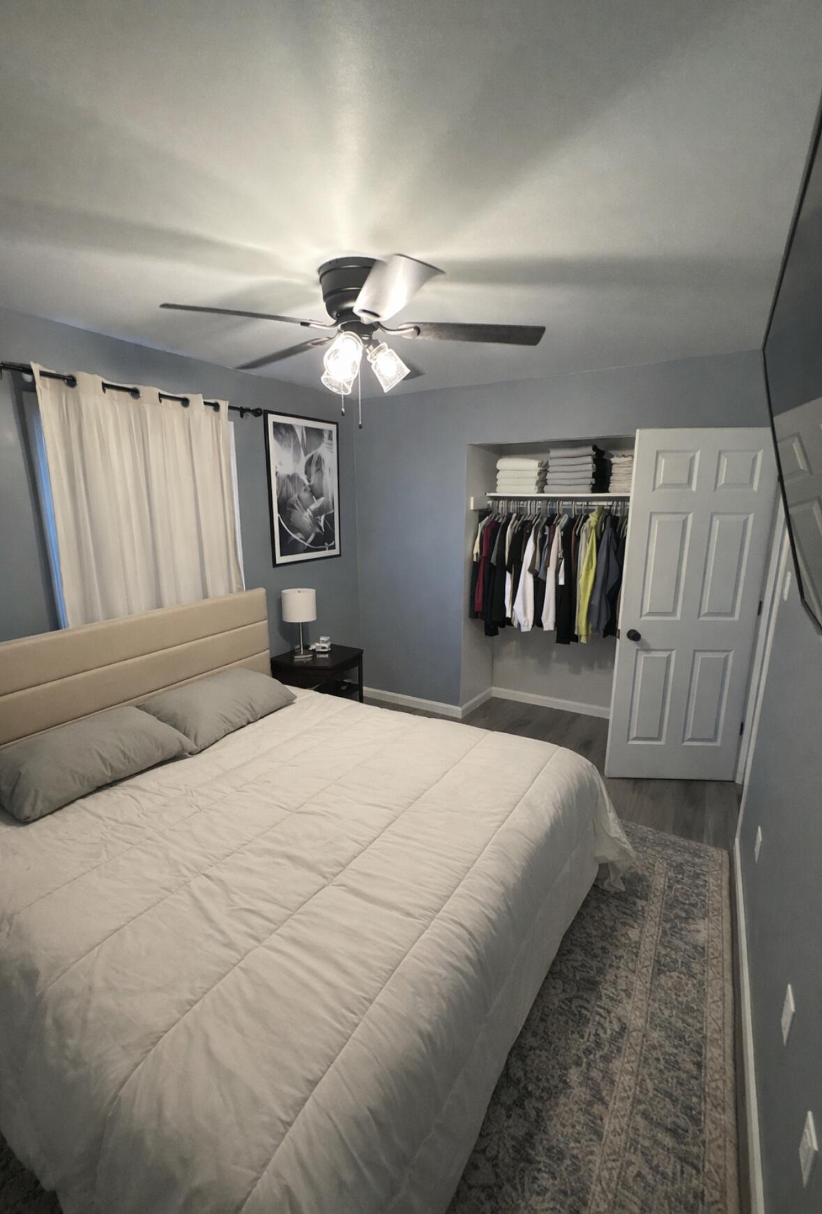 726-1 Imperial Road Valparaiso, IN 46385 - Photo 4 of 8 a bedroom with a bed and a walk in closet