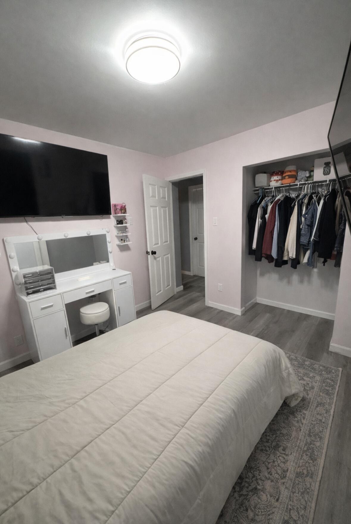 726-1 Imperial Road Valparaiso, IN 46385 - Photo 5 of 8 a bedroom with a bed and a flat screen tv