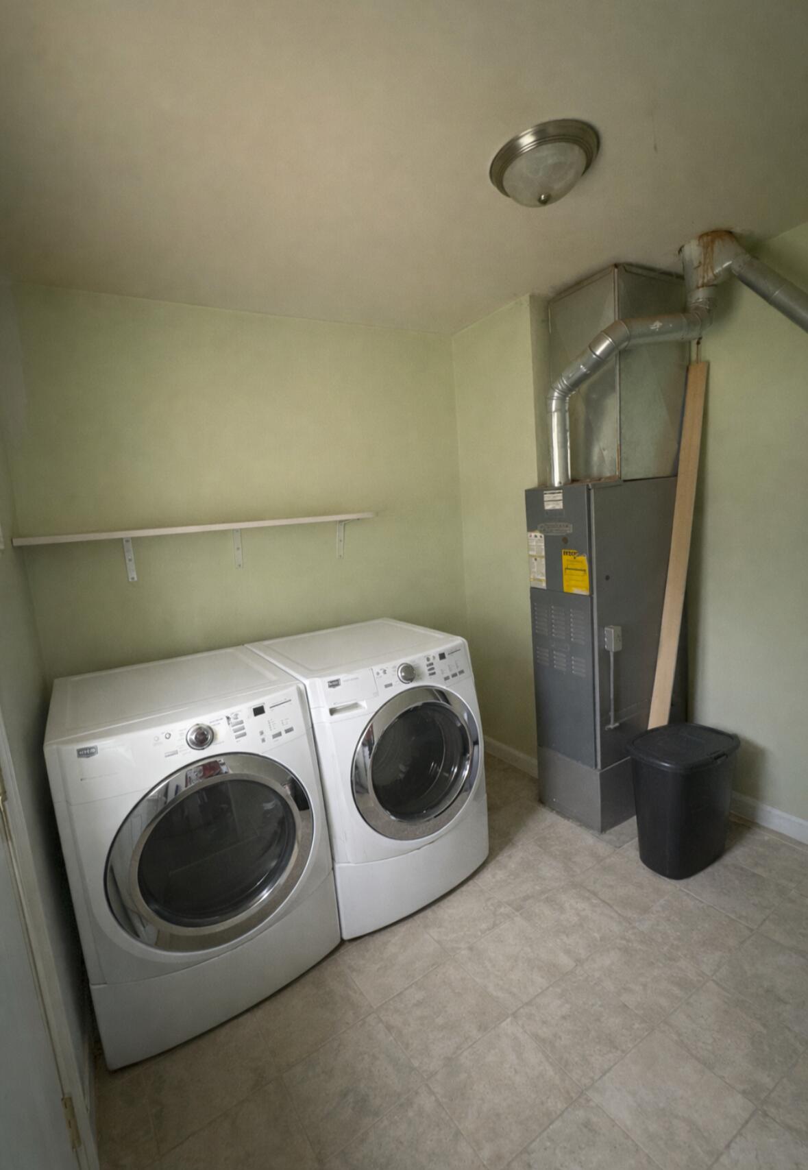 726-1 Imperial Road Valparaiso, IN 46385 - Photo 8 of 8 a utility room with dryer and washer