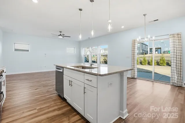 a bathroom with a sink and a large mirror