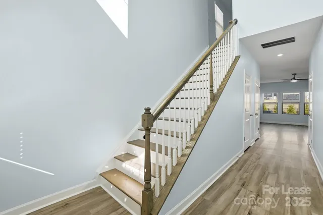 a view of entryway with wooden floor