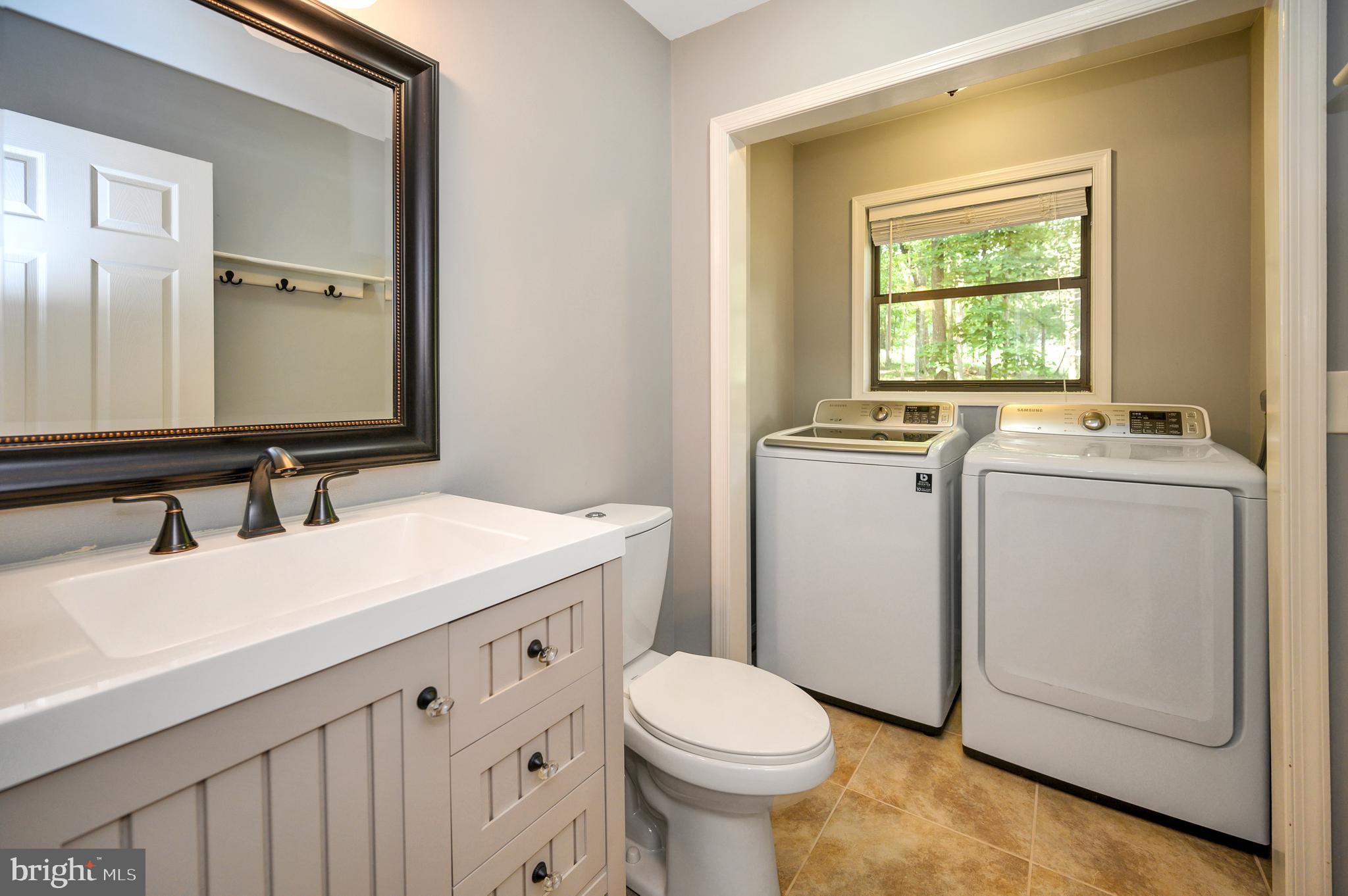 519 Birdie Road Locust Grove, VA 22508 - Photo 19 of 33 Main level 1/2 bath and laundry