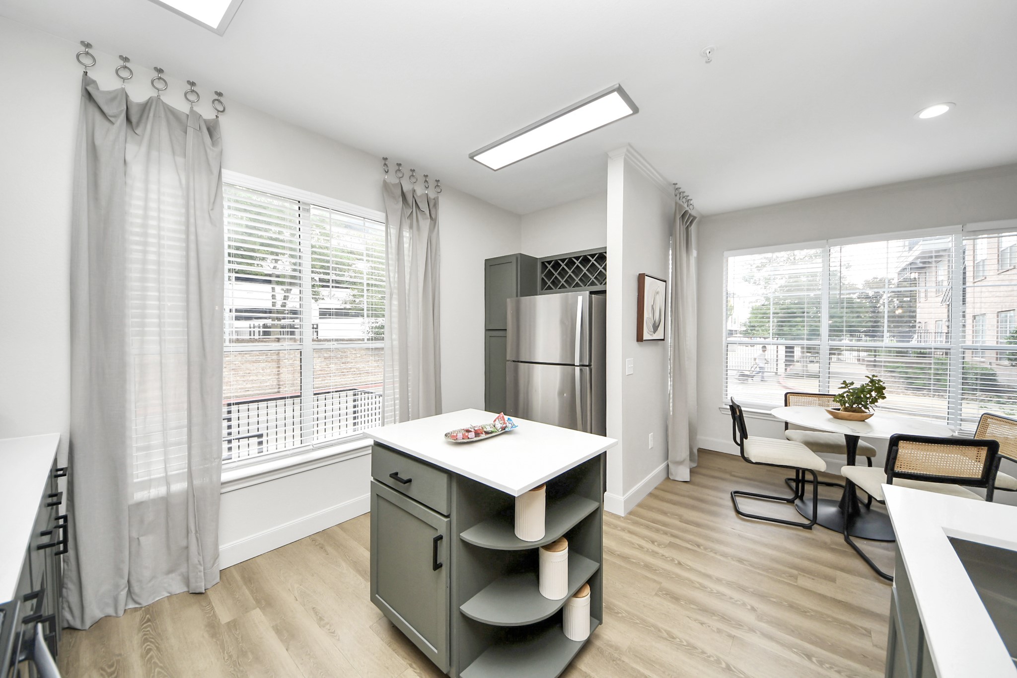 3003 Memorial Court, Unit 2434 Houston, TX 77007 - Photo 28 of 34 a living room with furniture and wooden floor