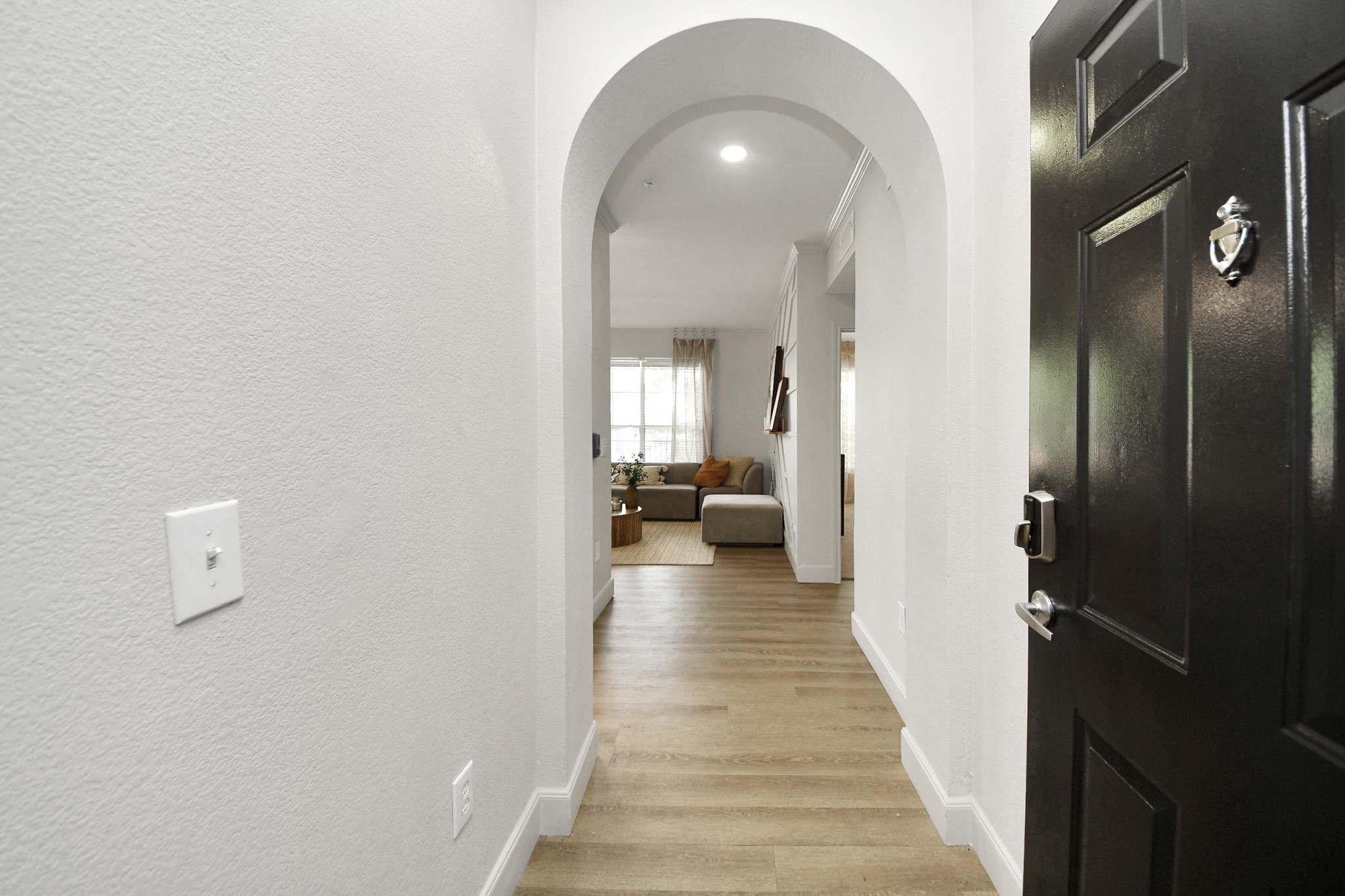 3003 Memorial Court, Unit 2434 Houston, TX 77007 - Photo 33 of 34 a view of a bedroom from a hallway