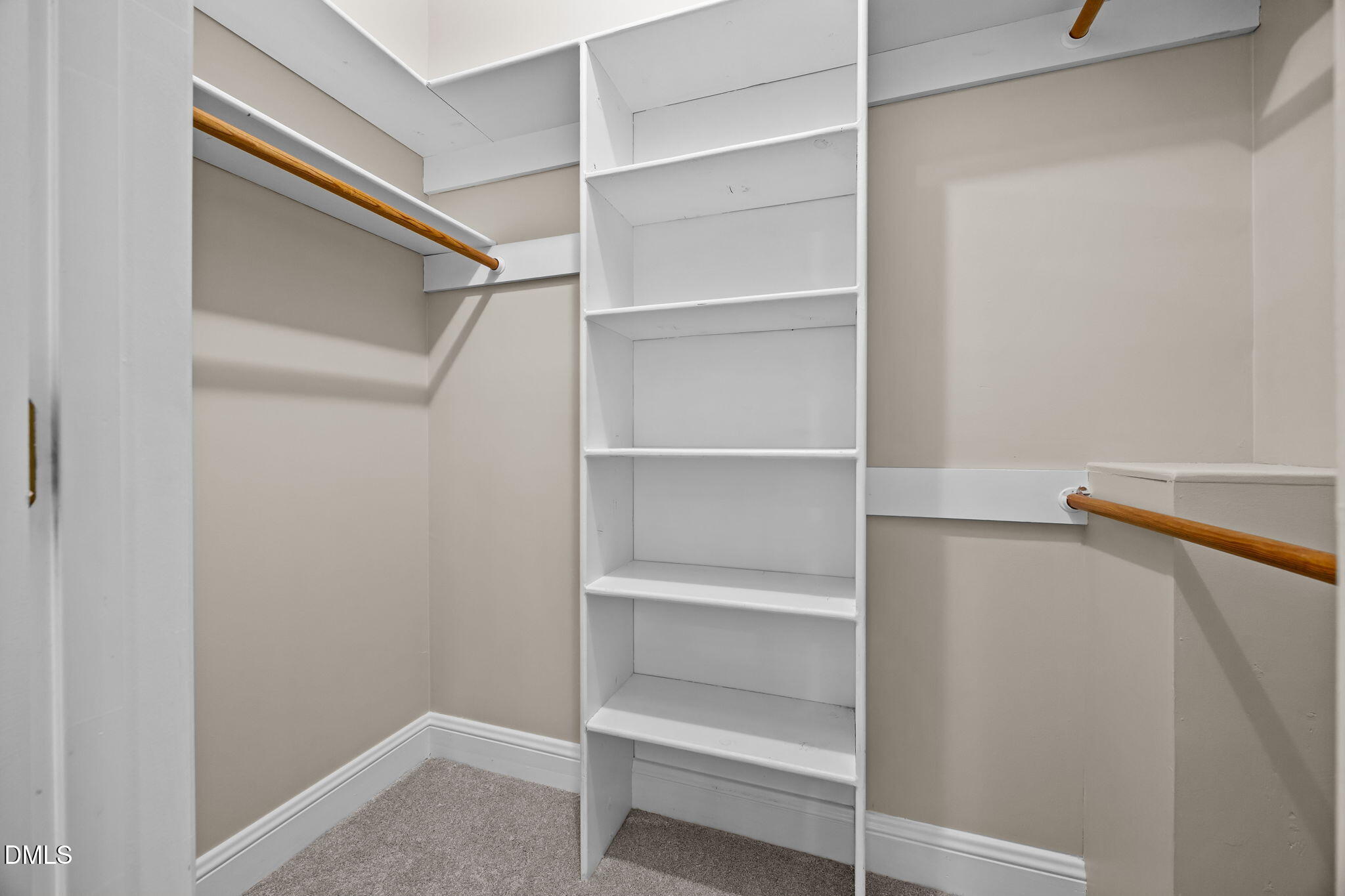 1535 Crenshaw Point Wake Forest, NC 27587 - Photo 17 of 27 a view of walk in closet with empty racks