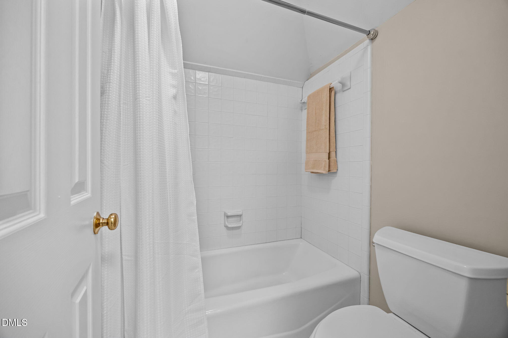 1535 Crenshaw Point Wake Forest, NC 27587 - Photo 21 of 27 a bathroom with a toilet and bathtub
