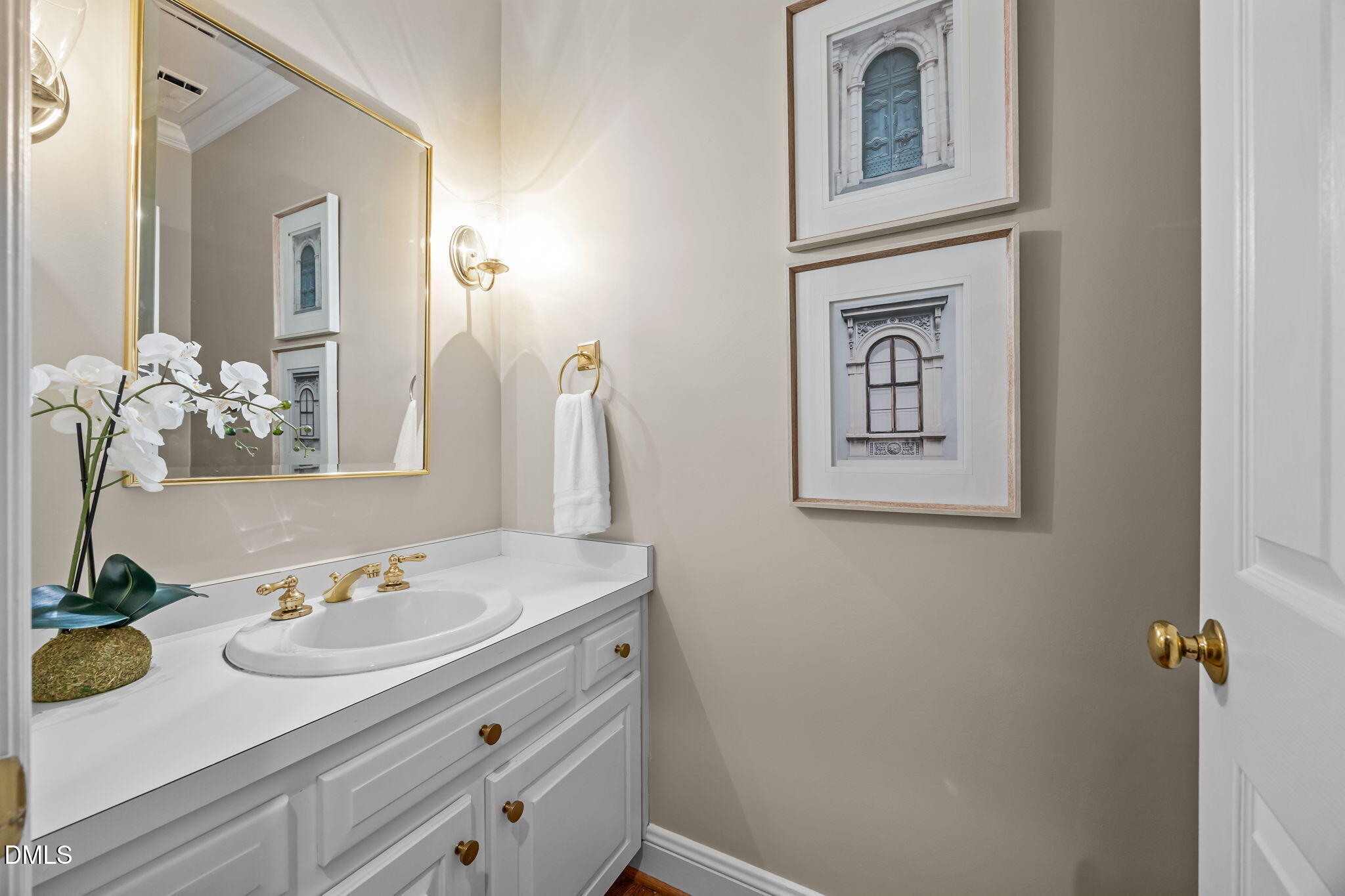1535 Crenshaw Point Wake Forest, NC 27587 - Photo 9 of 27 a bathroom with a sink and a mirror