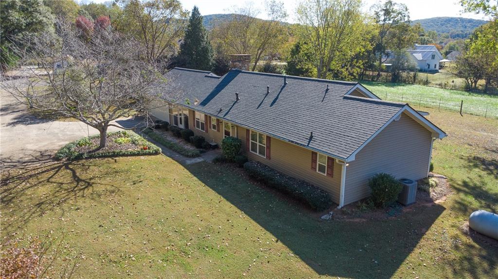 4920 McCoy Circle Cumming, GA 30040 - Photo 25 of 31 a view of a house with a yard