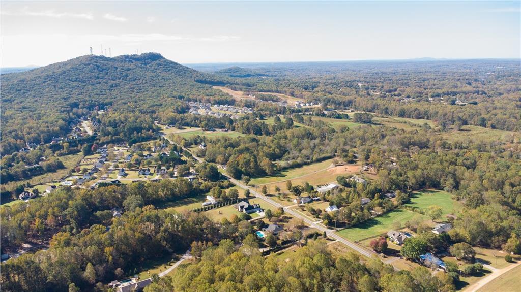 4920 McCoy Circle Cumming, GA 30040 - Photo 31 of 31 an aerial view of residential house and green space
