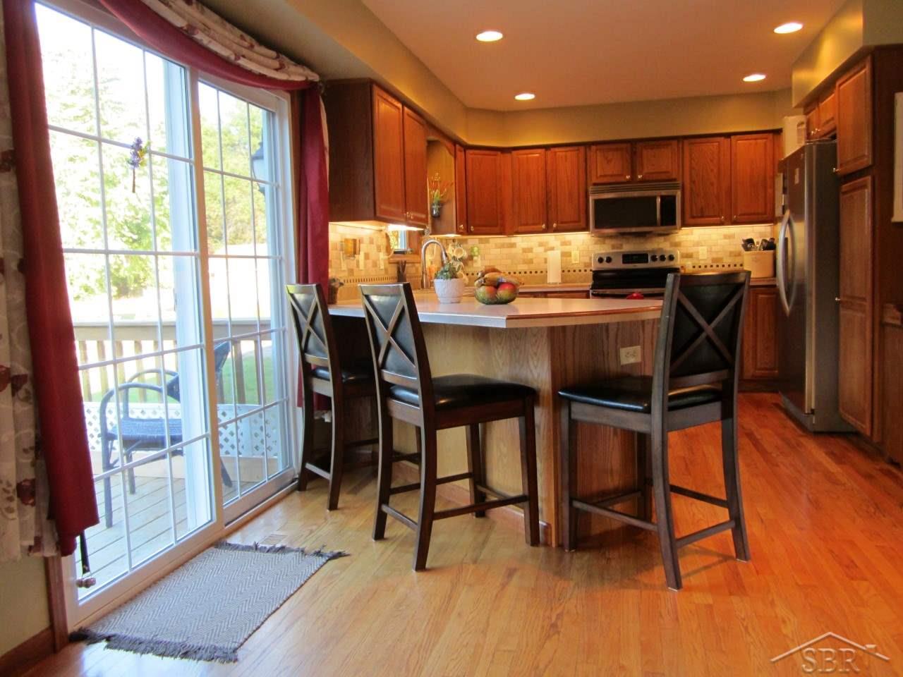 11820 Prior Road St. Charles, MI 48655 - Photo 5 of 43 Bright kitchen with breakfast bar
