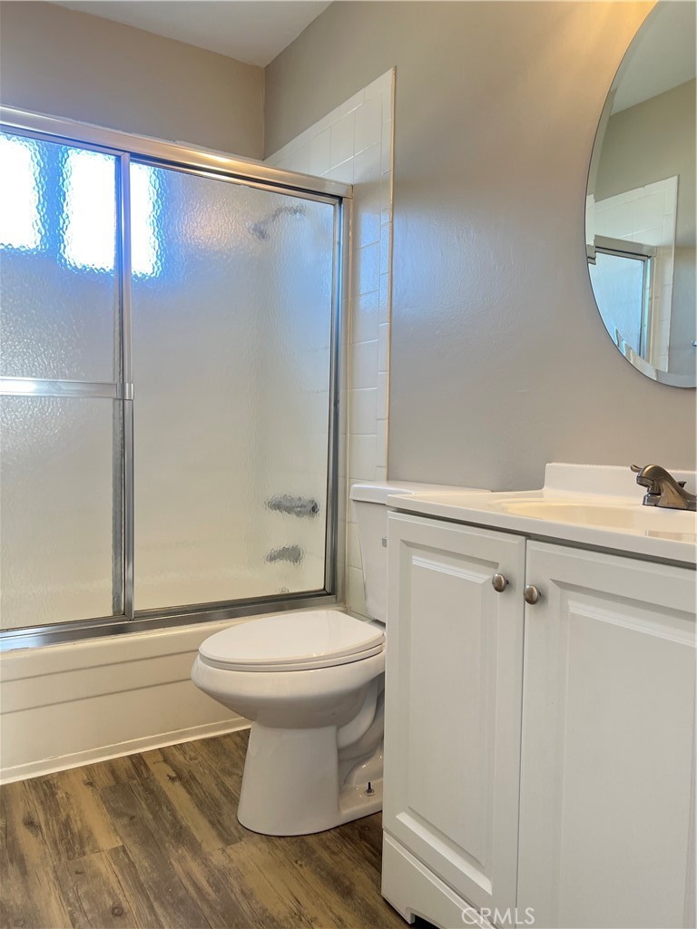 4920 Maine Avenue, Unit M Baldwin Park, CA 91706 - Photo 11 of 17 a bathroom with a sink toilet and shower