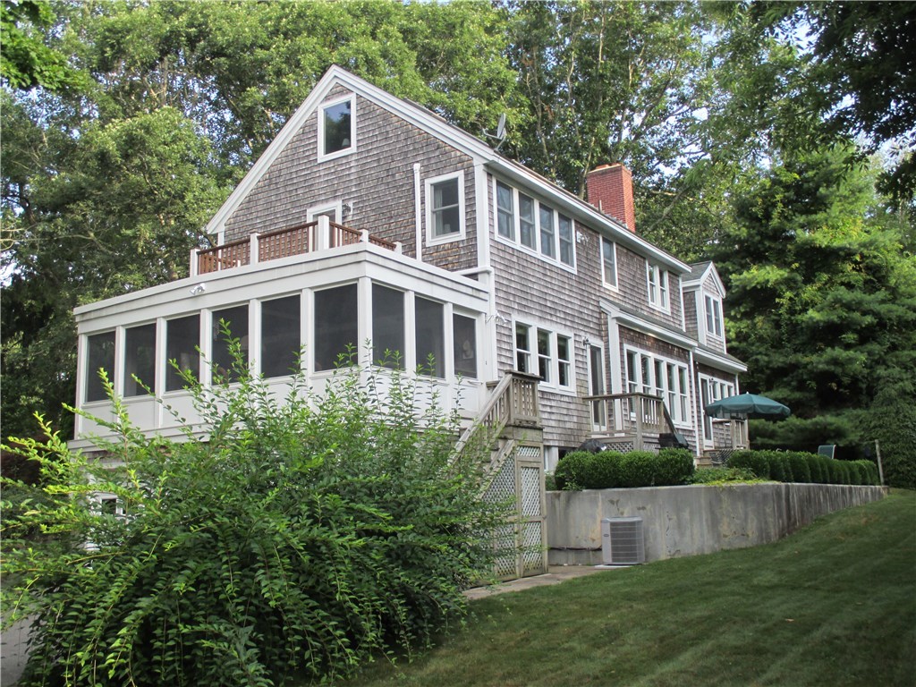 52 Verdi Road Westerly, RI 02891 - Photo 5 of 40 Private yard with seasonal water views and tons of windows to catch the sun.