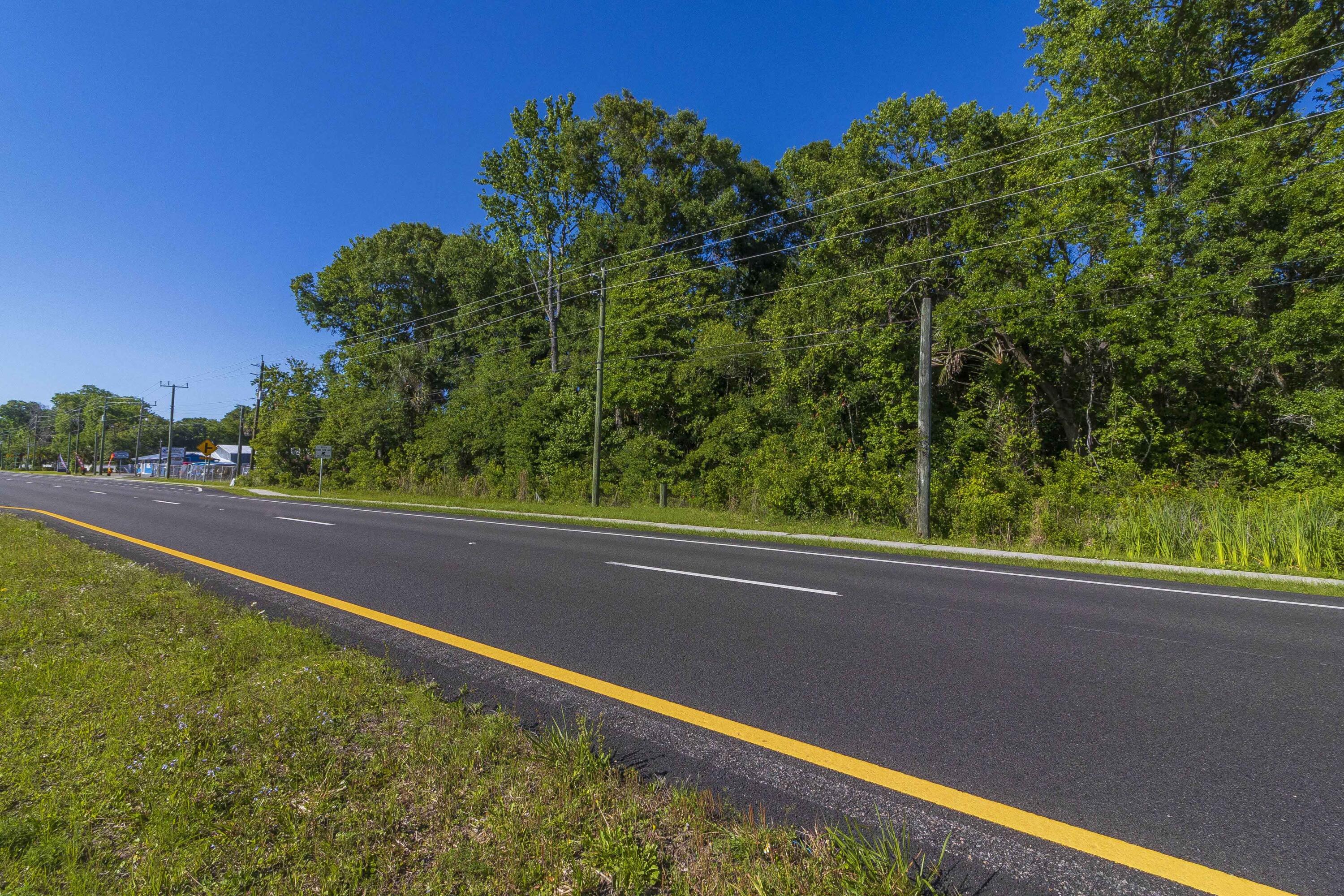 5900 U.S. Rte 1 St. Augustine, FL 32086 - Photo 4 of 7 a view of a yard with a street