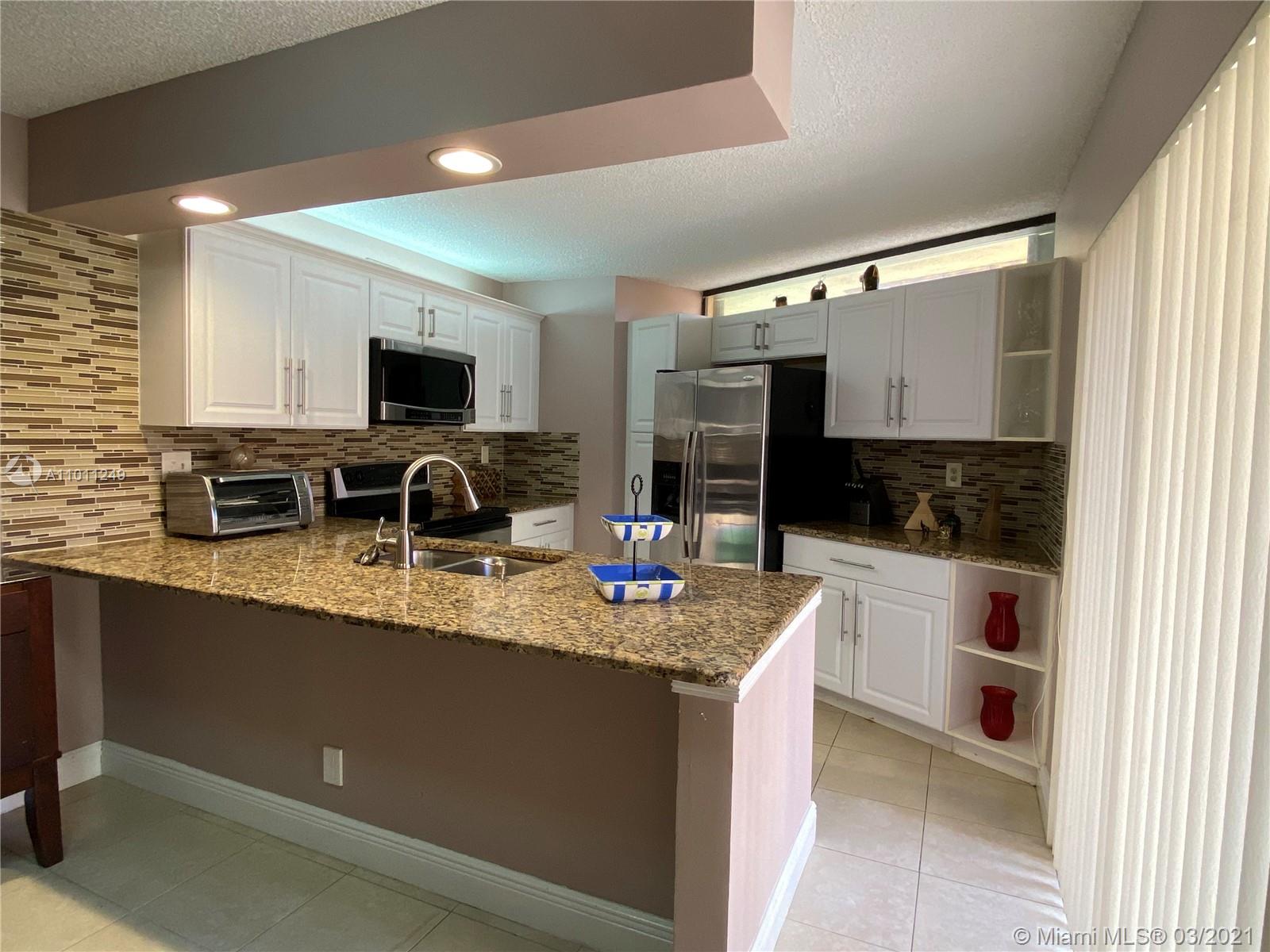 8353 Trent Court, Unit A Boca Raton, FL 33433 - Photo 4 of 23