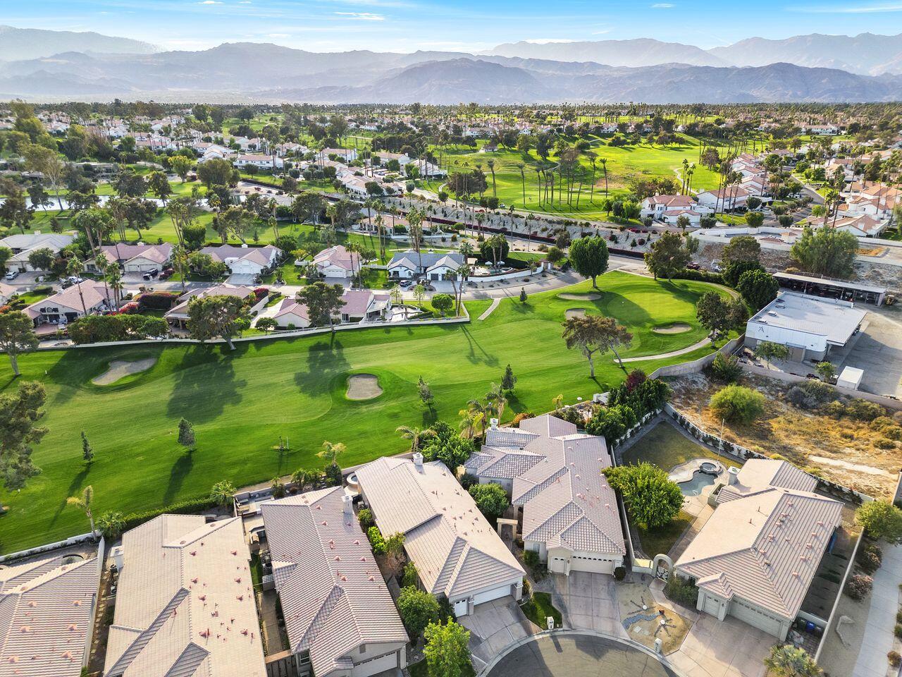 75715 Heritage West Palm Desert, CA 92211 - Photo 30 of 51 an aerial view of residential houses with outdoor space and river
