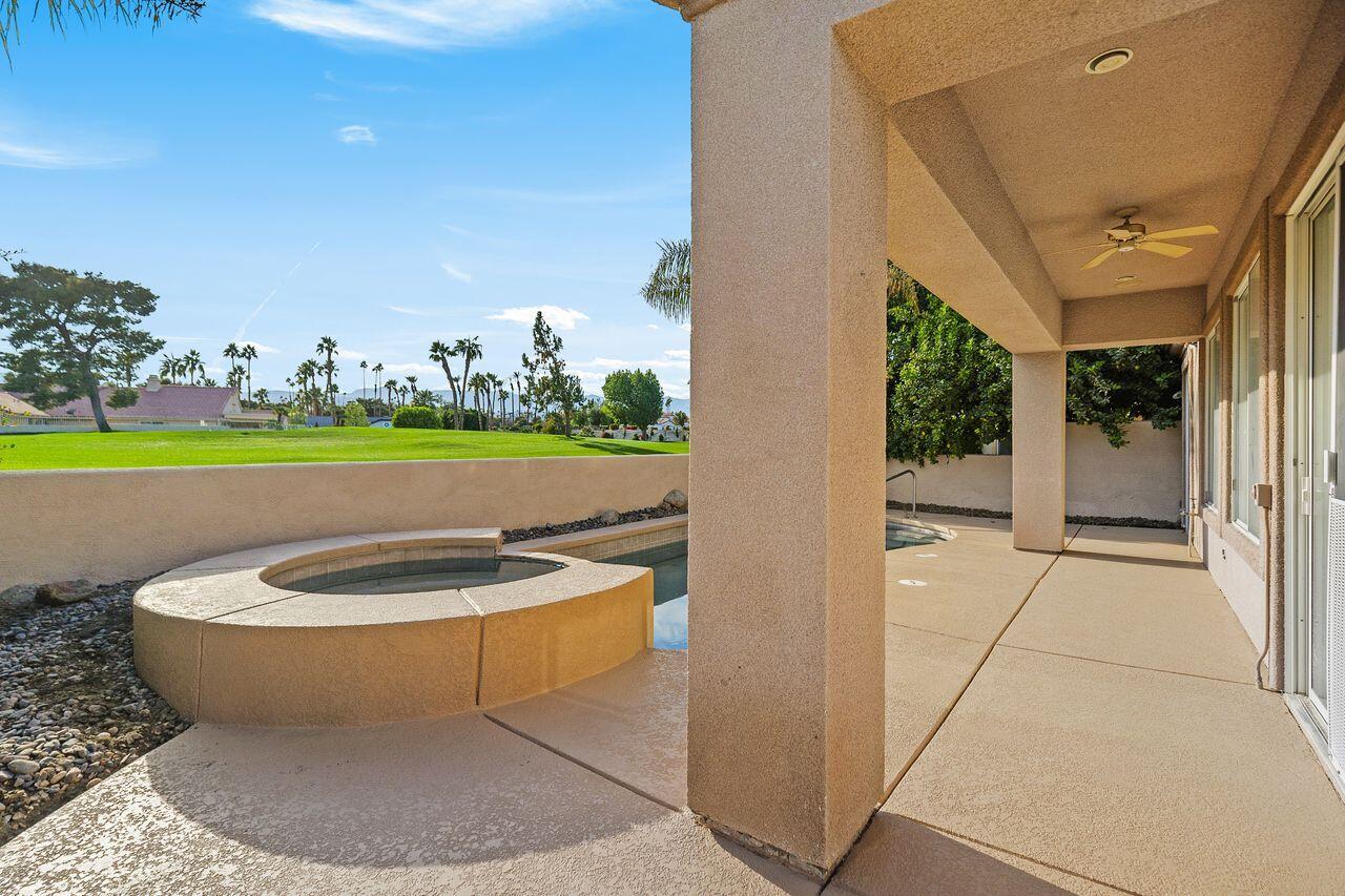 75715 Heritage West Palm Desert, CA 92211 - Photo 33 of 51 a view of a swimming pool with a lounge chair