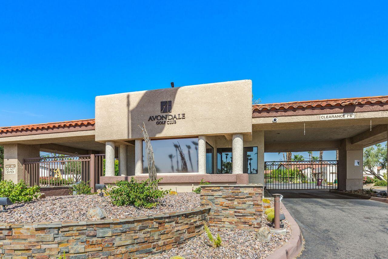 75715 Heritage West Palm Desert, CA 92211 - Photo 35 of 51 a view of a building with a window and a fireplace