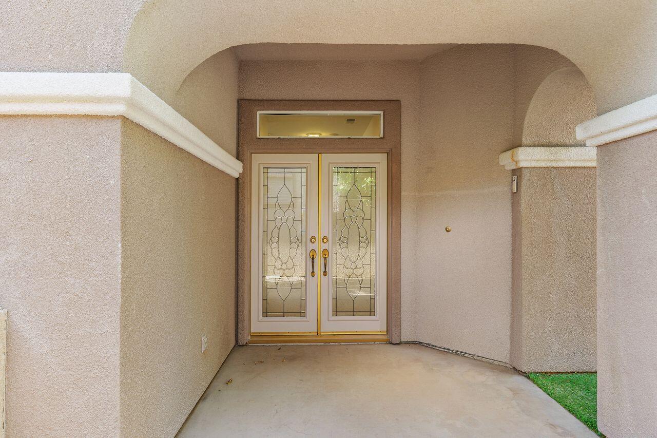 75715 Heritage West Palm Desert, CA 92211 - Photo 9 of 51 a view of an front door