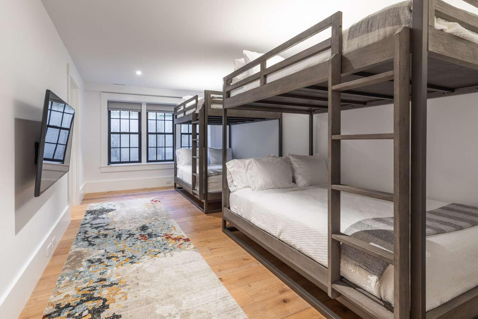 11 A Meadow Lane Nantucket, MA 02554 - Photo 16 of 20 a bedroom with a bed and glass door