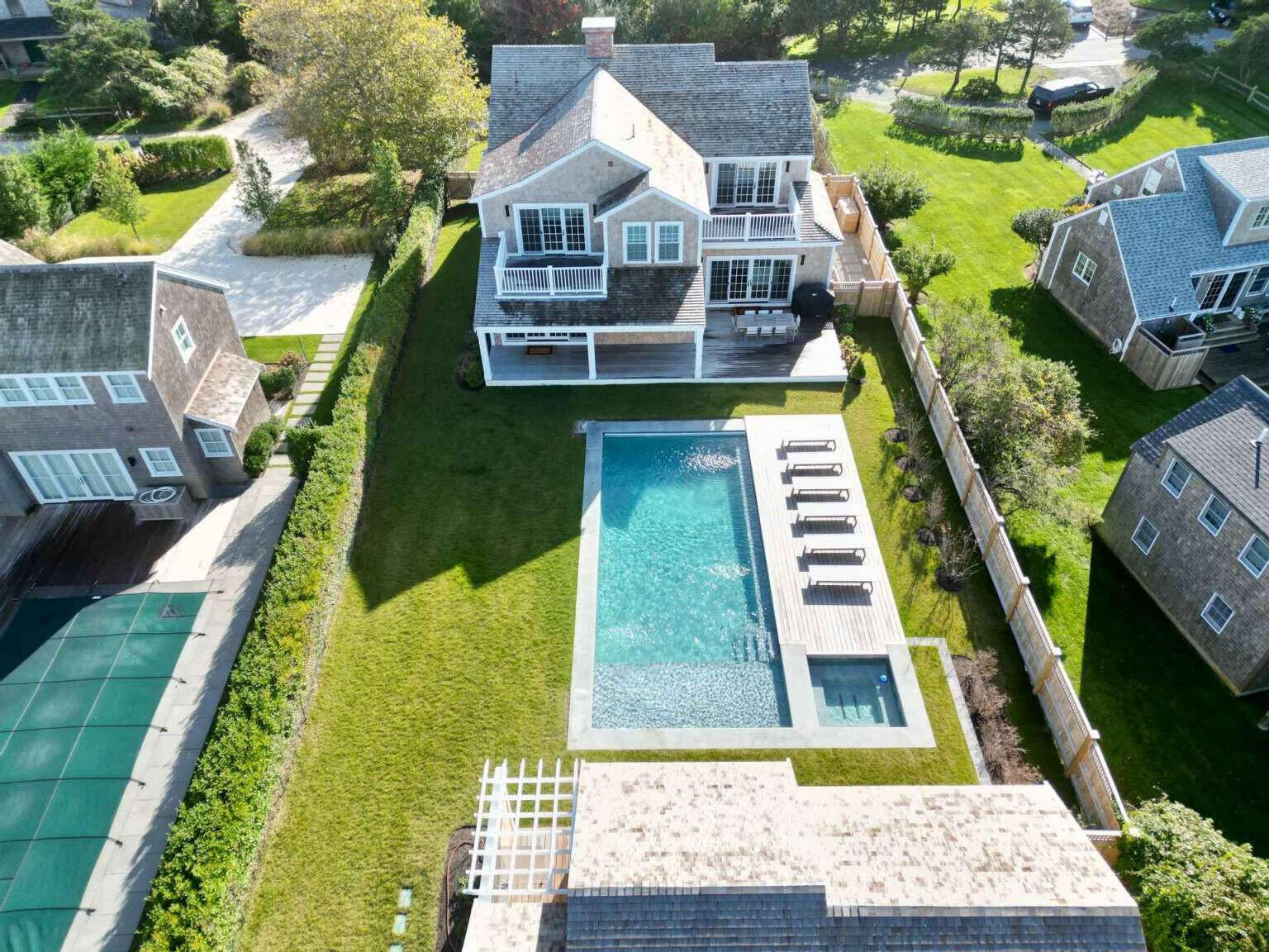 11 A Meadow Lane Nantucket, MA 02554 - Photo 4 of 20 swimming pool view with a garden