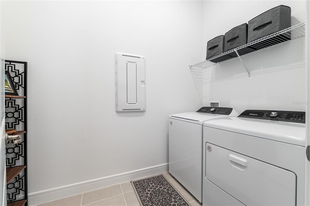 8809 Southwest 61st Loop Ocala, FL 34481 - Photo 22 of 41 a utility room with dryer and washer