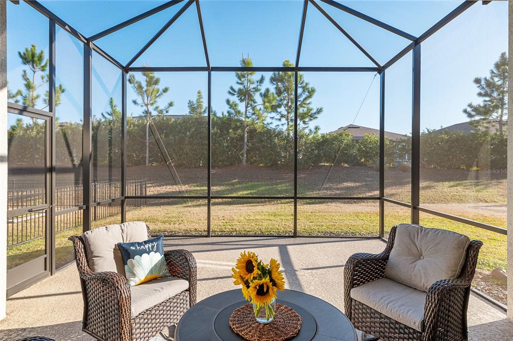 8809 Southwest 61st Loop Ocala, FL 34481 - Photo 25 of 41 a living room with furniture and a window