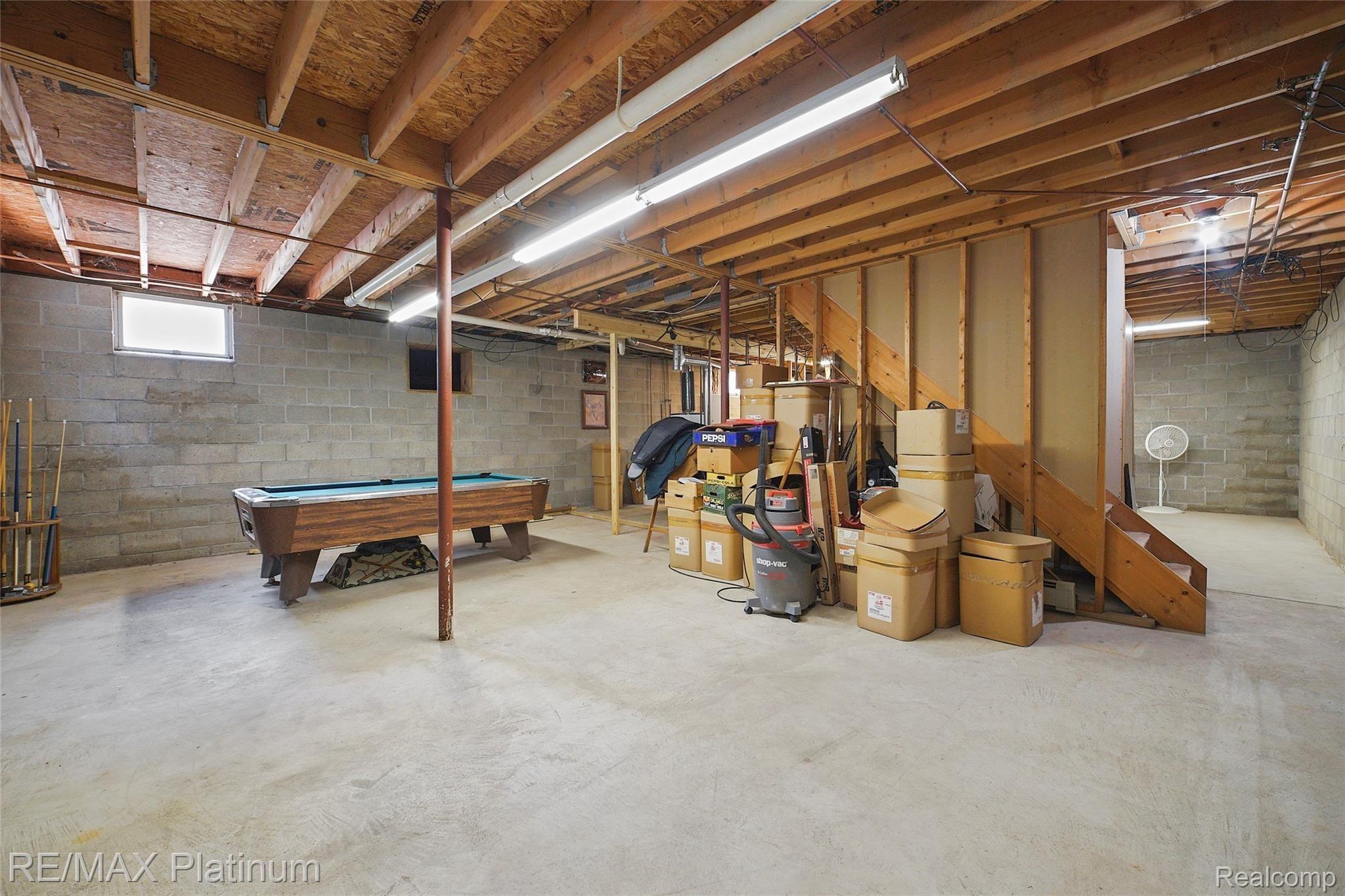 7055 West Allen Road Fowlerville, MI 48836 - Photo 28 of 34 027-photo-unfinished-basement-9469710.jpg