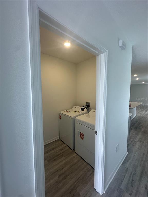 4667 Ostero Street Winter Haven, FL 33880 - Photo 18 of 24 a view of utility room with washer and dryer