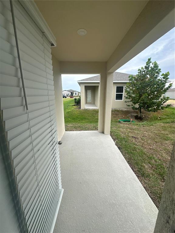 4667 Ostero Street Winter Haven, FL 33880 - Photo 19 of 24 a view of a backyard of the house