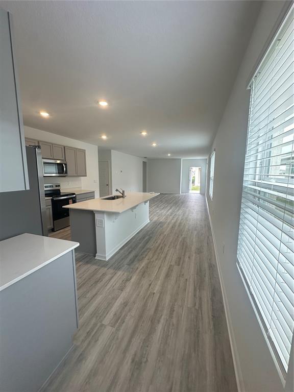 4667 Ostero Street Winter Haven, FL 33880 - Photo 6 of 24 a view of kitchen with wooden floor