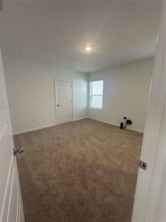 4667 Ostero Street Winter Haven, FL 33880 - Photo 10 of 24 a view of room and window