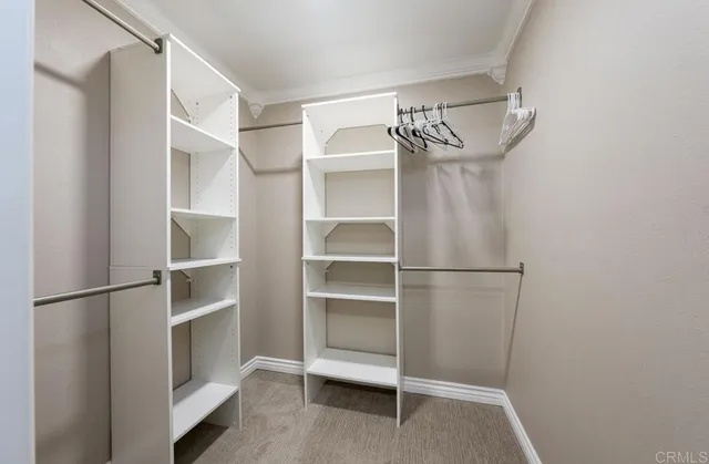 a view of an empty walk in closet
