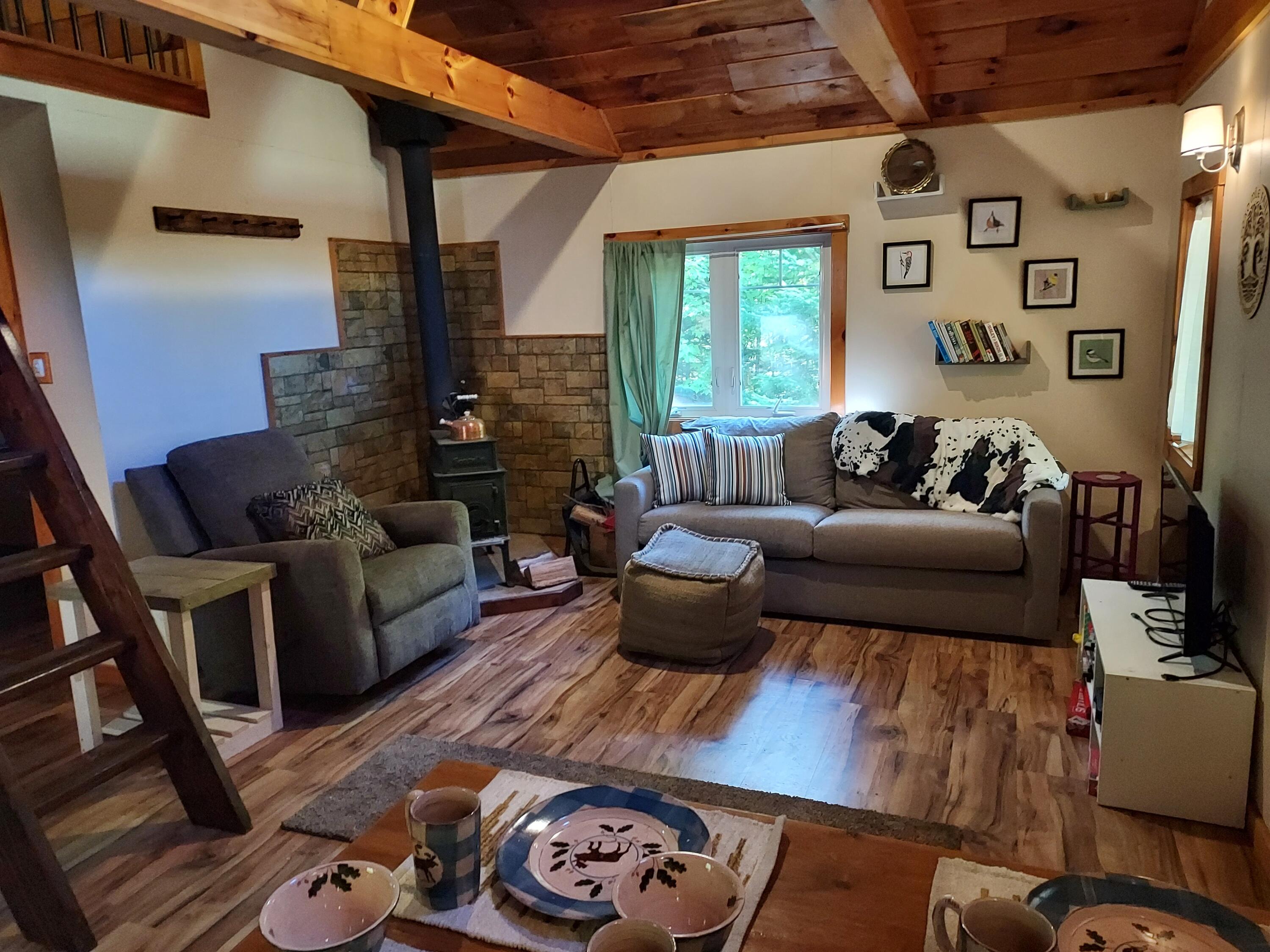 429 Hole In The Wall Road Solon, ME 04979 - Photo 14 of 34 Living Room, Wood Stove