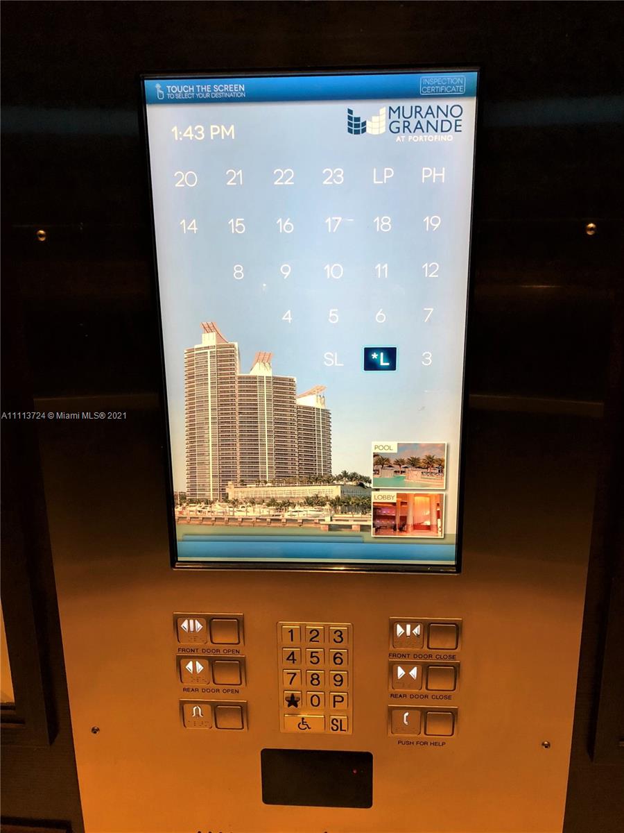 400 Alton Road, Unit 1011 Miami Beach, FL 33139 - Photo 21 of 27 a view of a building from a window