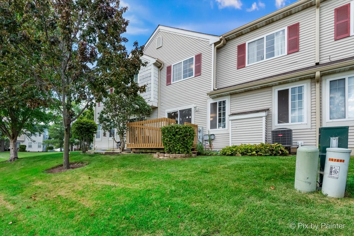 10769 Cape Cod Lane Huntley, IL 60142 - Photo 22 of 25 a view of a house with backyard
