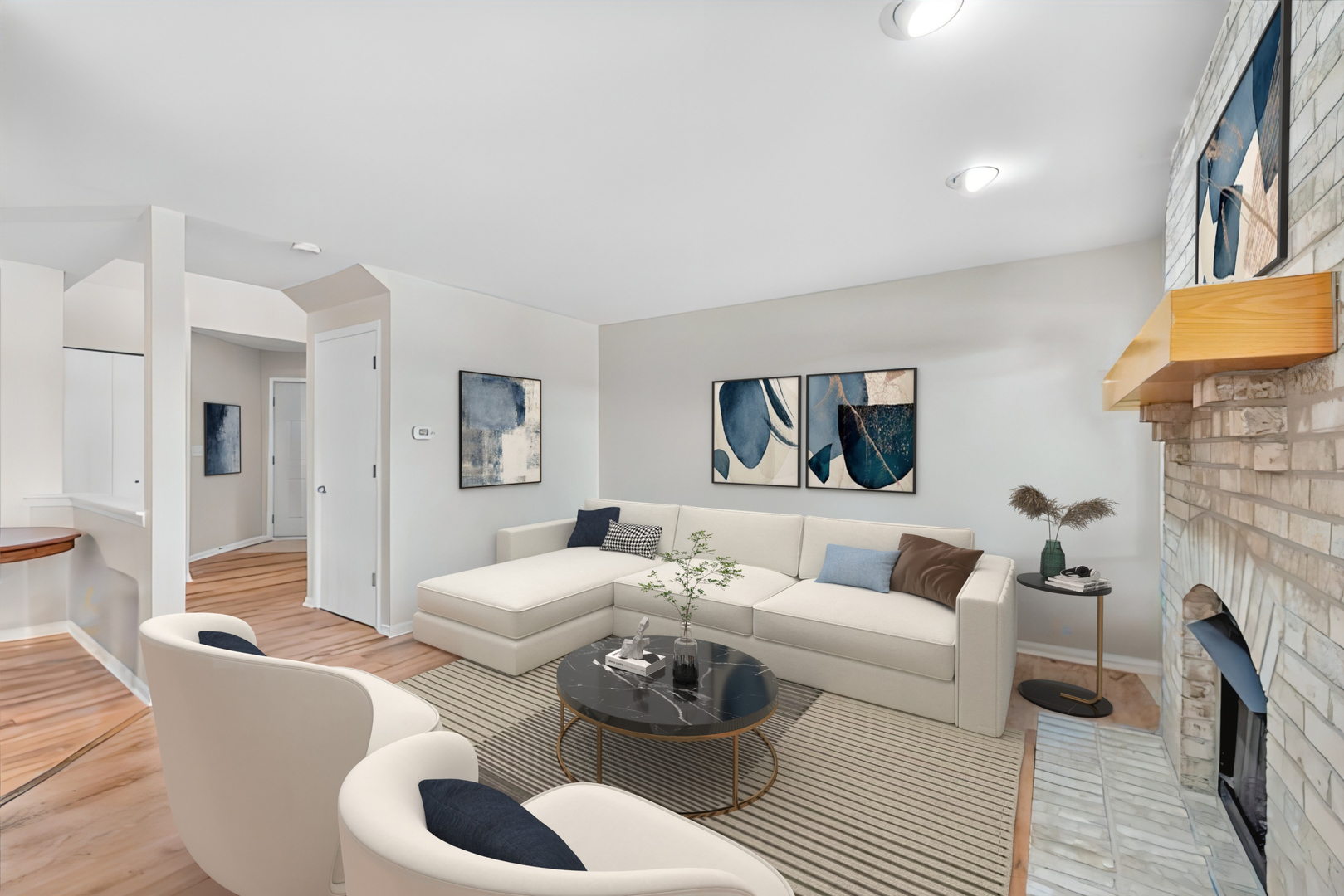 10769 Cape Cod Lane Huntley, IL 60142 - Photo 5 of 25 a living room with fireplace furniture and a couch