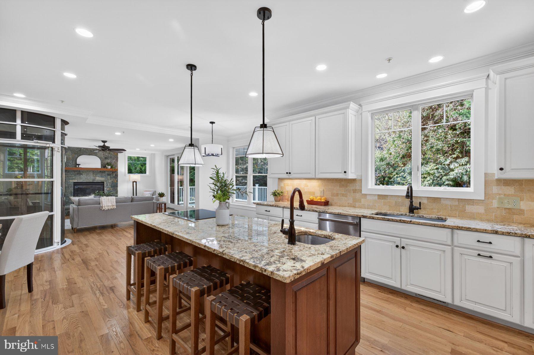 5011 Rugby Avenue Bethesda, MD 20814 - Photo 12 of 65 Family and guests can sit at the generous island