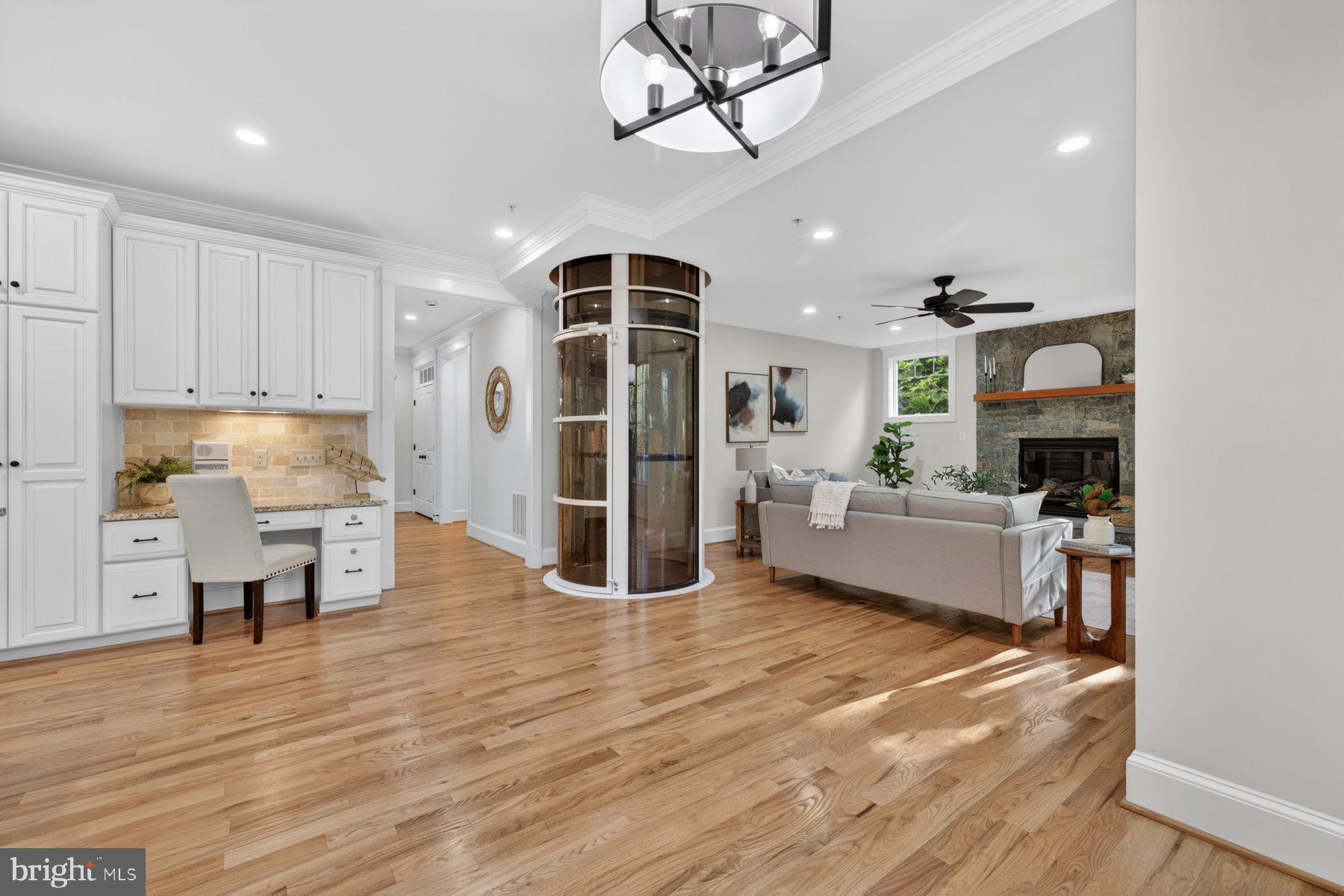 5011 Rugby Avenue Bethesda, MD 20814 - Photo 17 of 65 a living room with furniture and kitchen view