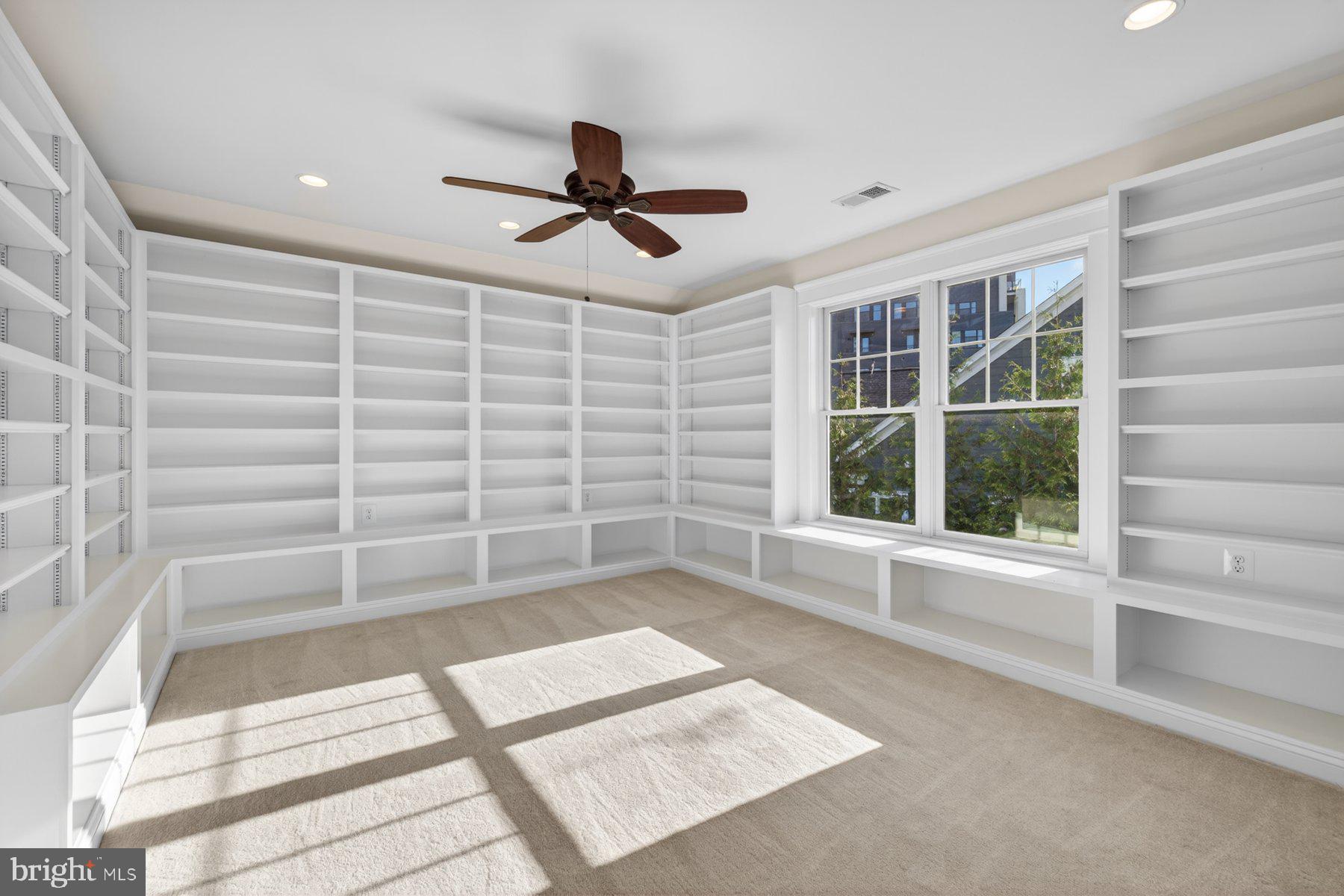 5011 Rugby Avenue Bethesda, MD 20814 - Photo 43 of 65 a view of an empty room with a window