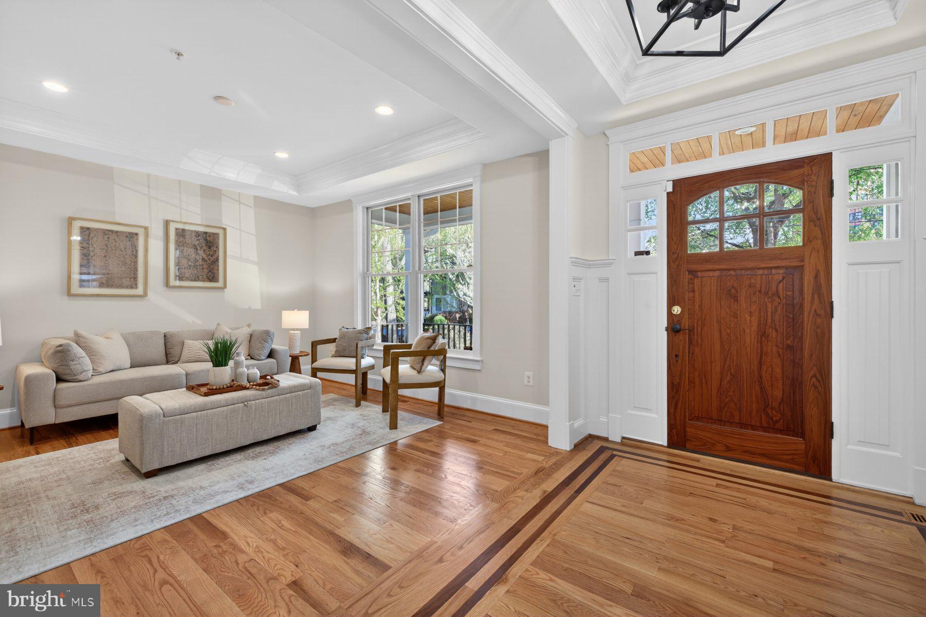 5011 Rugby Avenue Bethesda, MD 20814 - Photo 5 of 65 a living room with furniture and a window